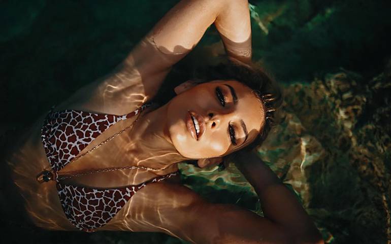 pretty mexican bride swimming